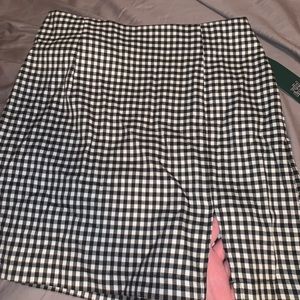 NEW WITH TAGS mini skirt with slit